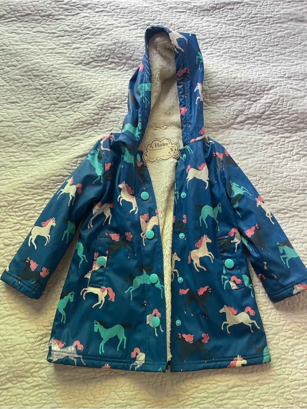 Hatley Teal Unicorn Print Hooded Raincoat (color changing when wet!)